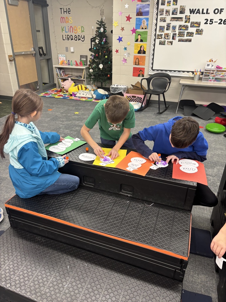 students doing a musical santa project