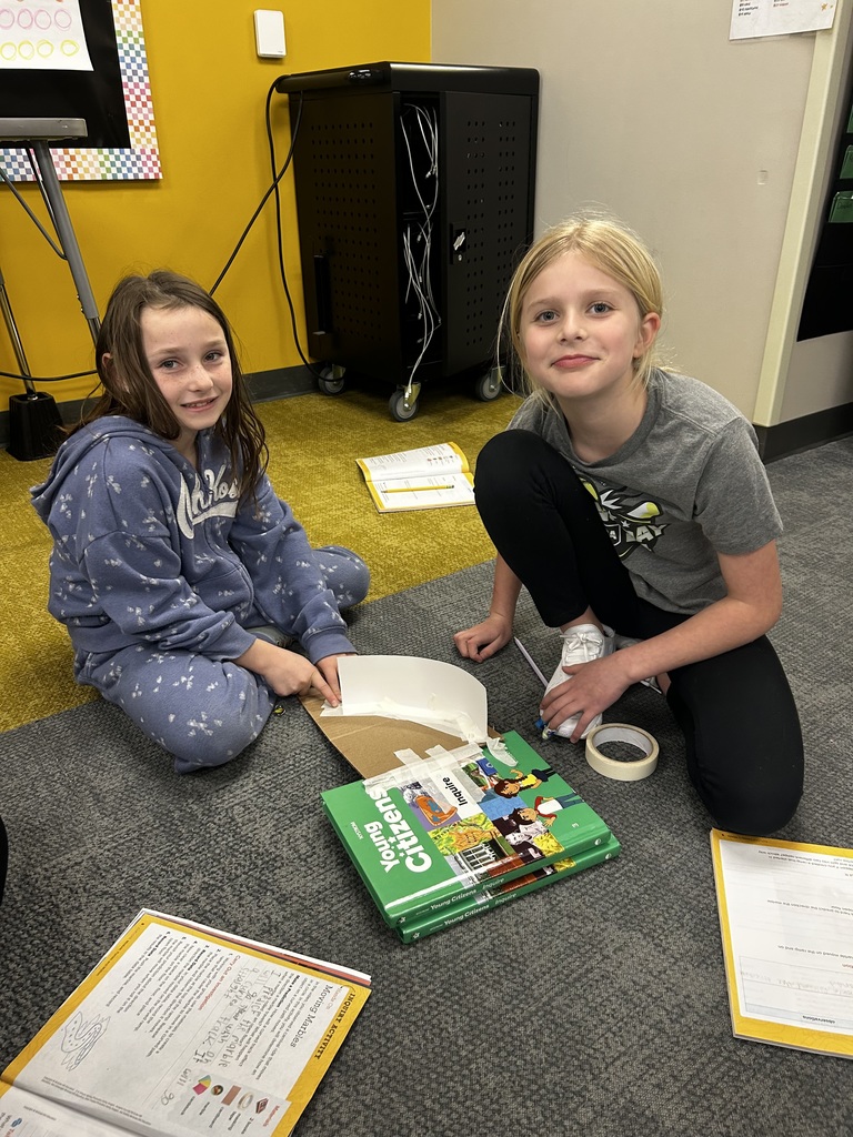 Students building ramps in a 3rd grade classroom