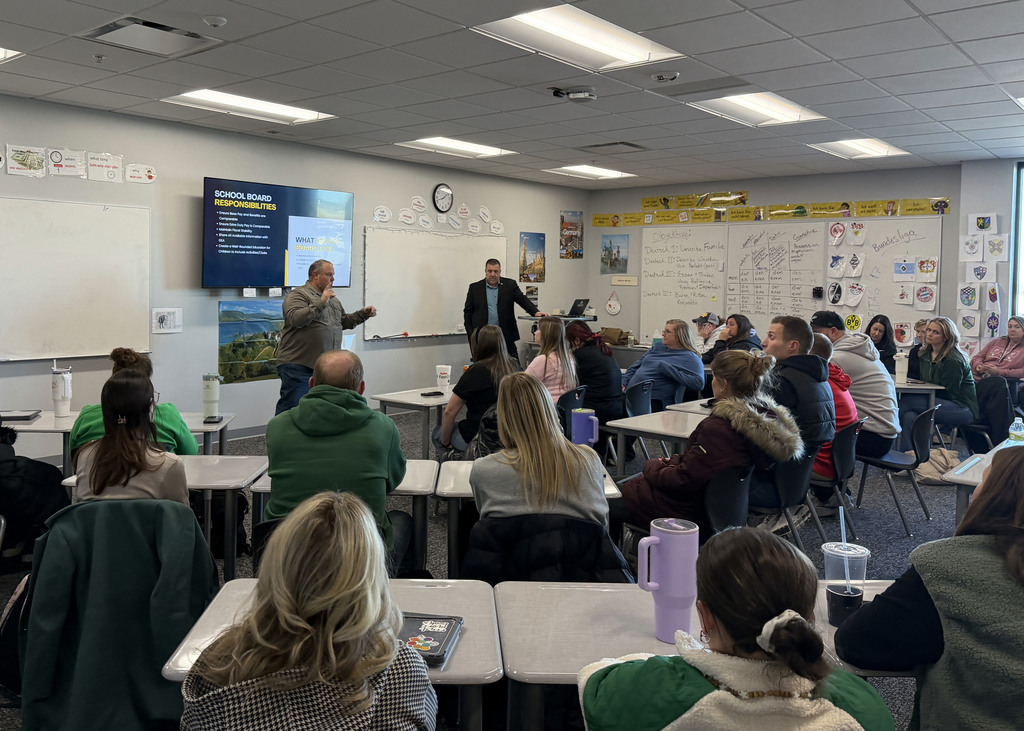 Superintendent Travis Lightle and Former Board Member David Gulizia speaking to GPS staff about negotiations