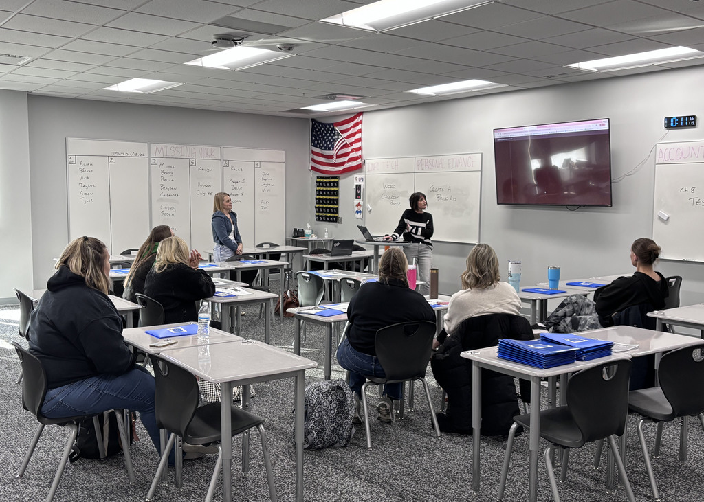 GPS staff sitting in a classroom learning on PD day