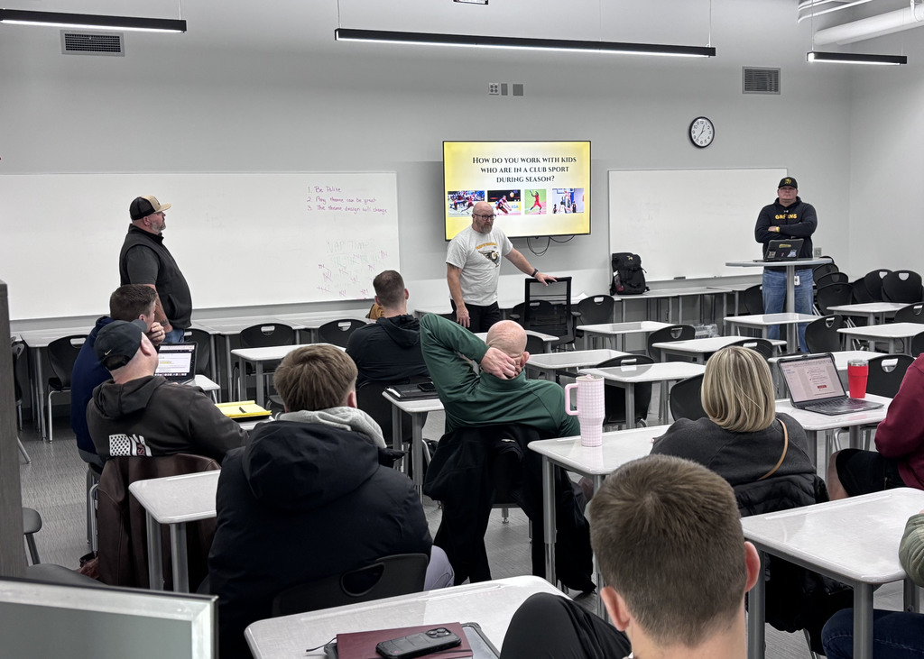 GPS staff on PD day learning coaching techniques