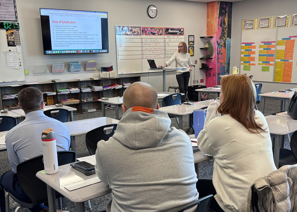 GPS staff sitting in classroom learning for PD day