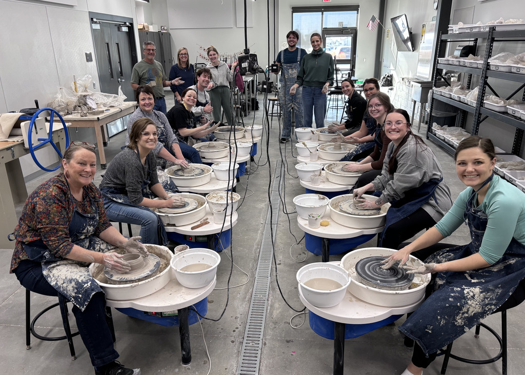 GPS staff on PD day spinning clay