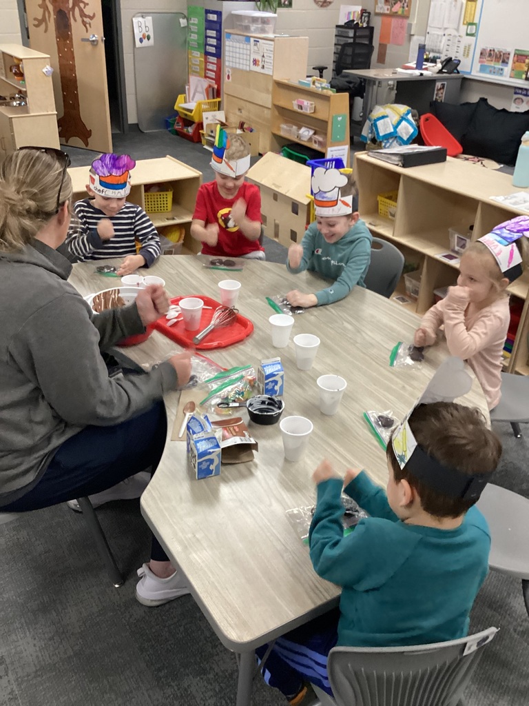 Kids making snacks in preschool