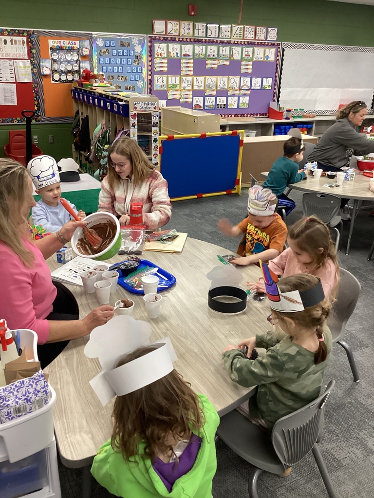 Kids making snacks in preschool