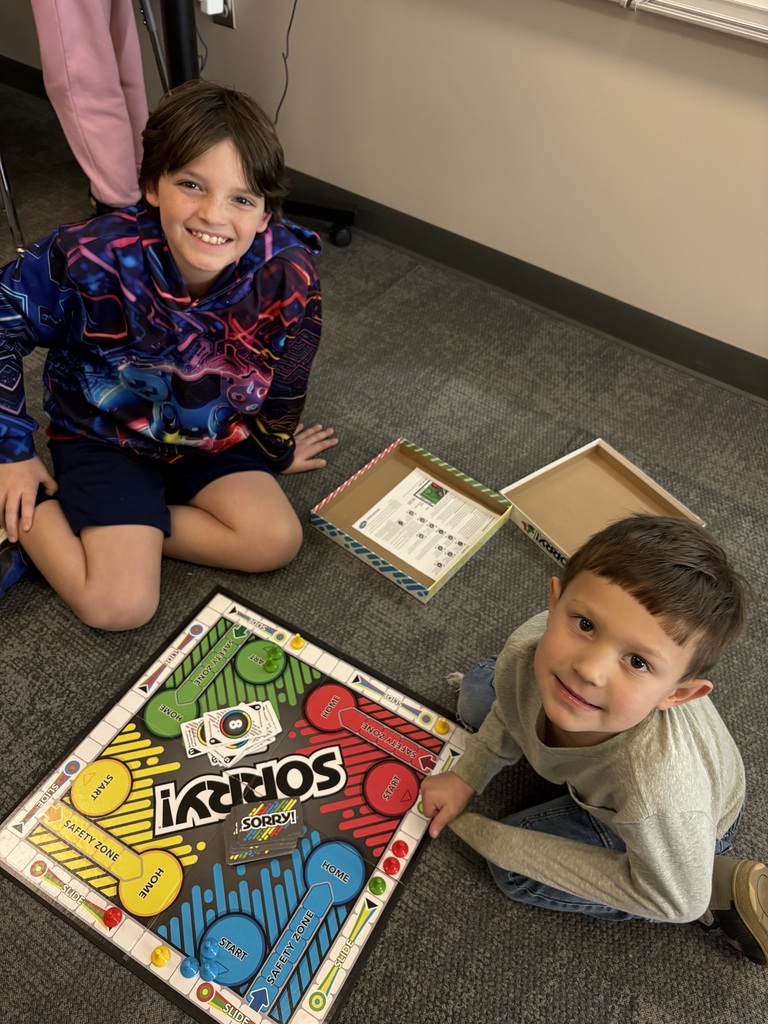 students playing a game in a classroom