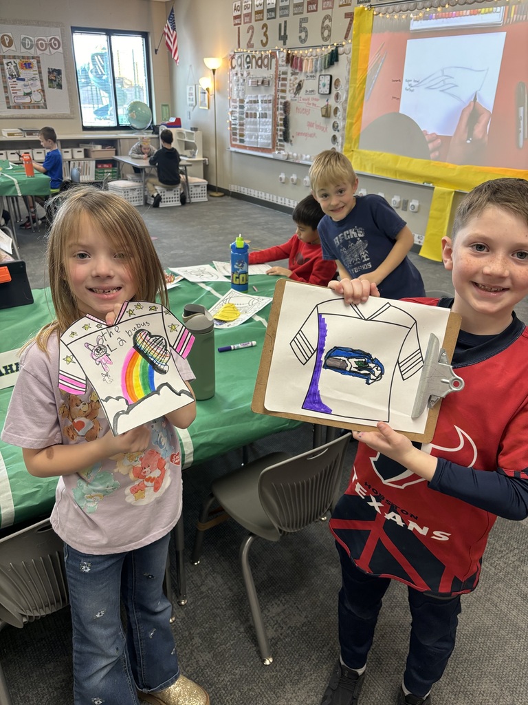 students showcase a superbowl themed coloring project