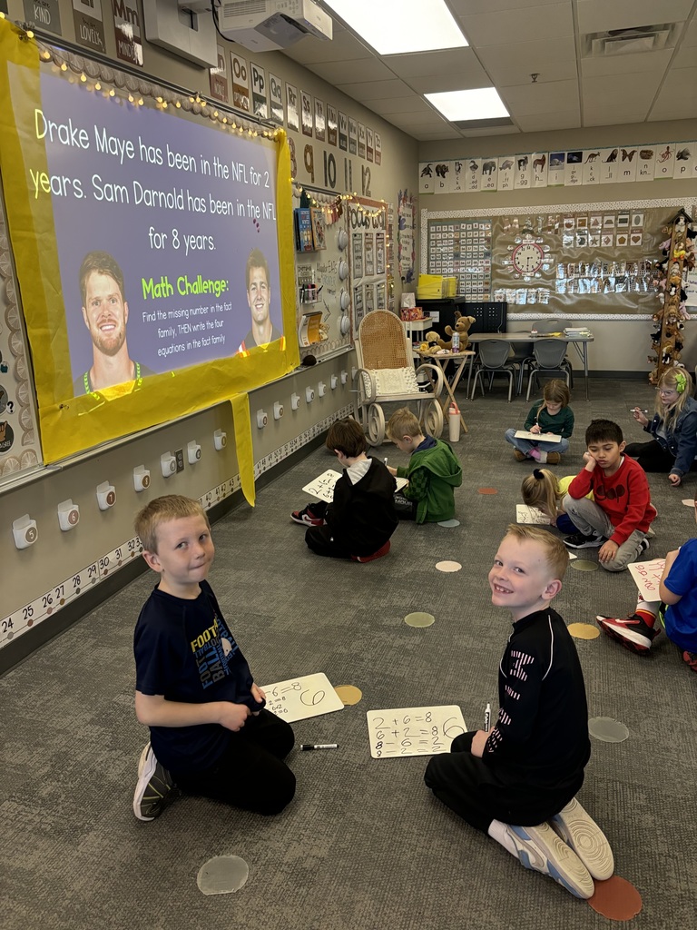 first graders in a classroom using the superbowl as a way to learn about math