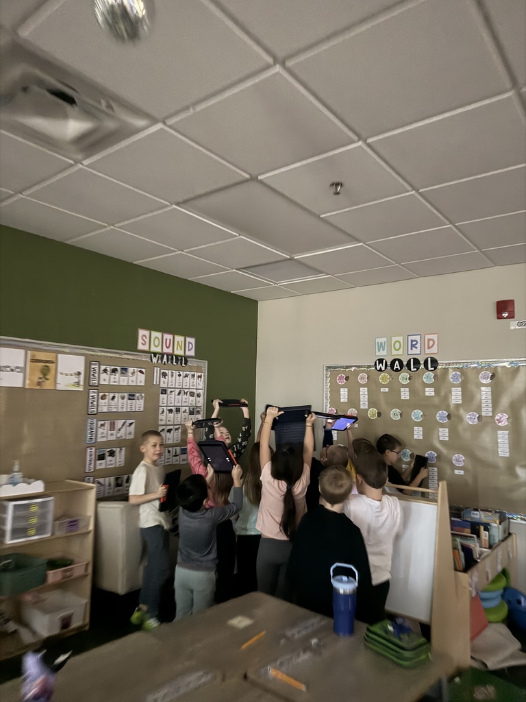 students looking at constellations using ipads