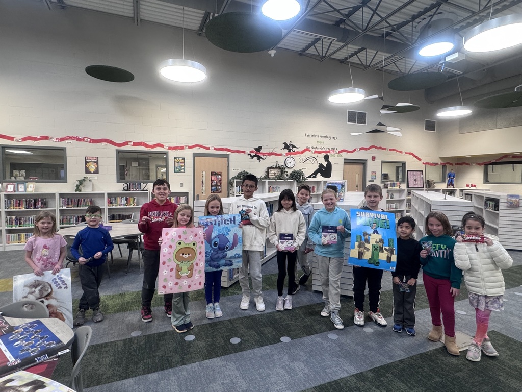 a group of students who won prizes for a book reading contest
