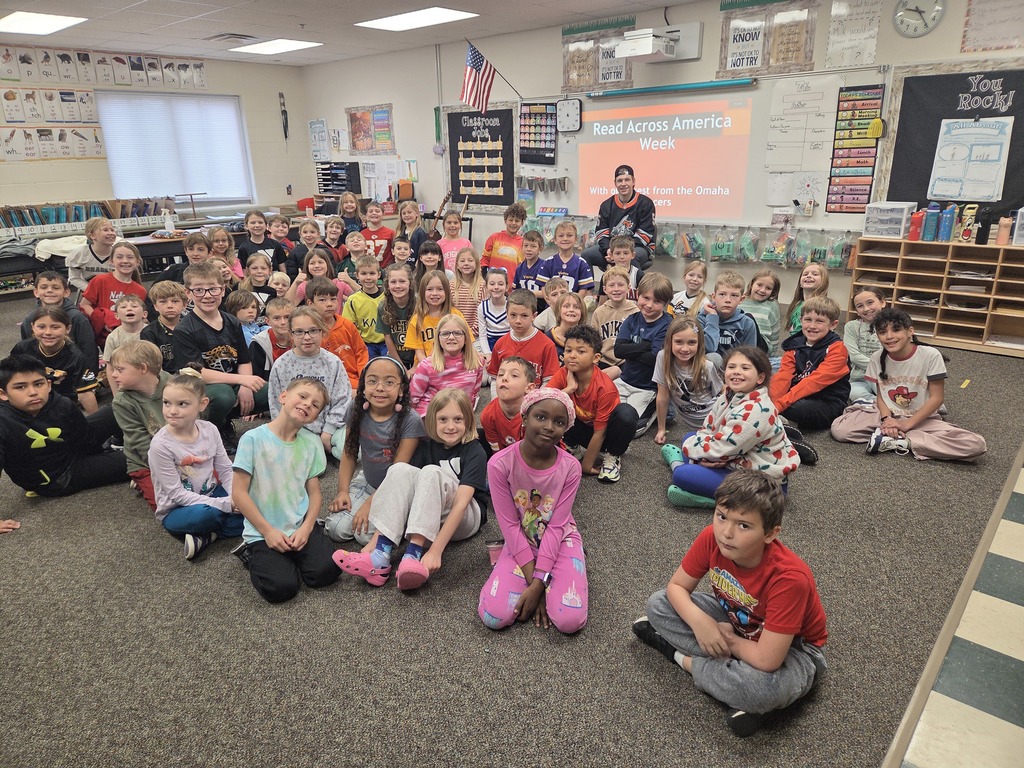 2nd grade students pictured with a member of the Omaha Lancers