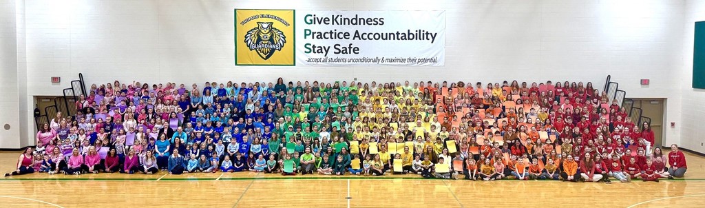 TES students and staff pictured in the gym during Read Across America Week.