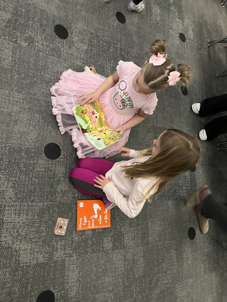 students reading to one another