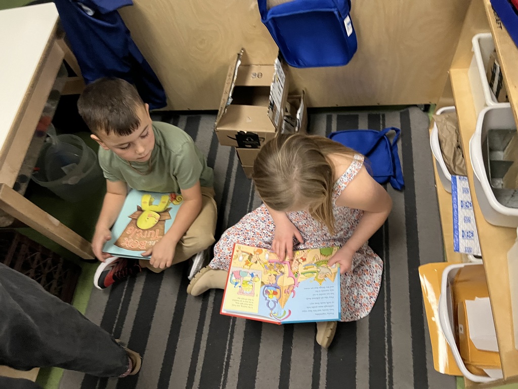 students reading to one another