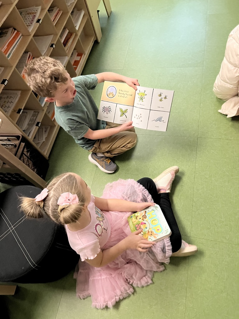 students reading to one another