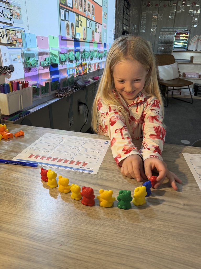 student working on math using counters