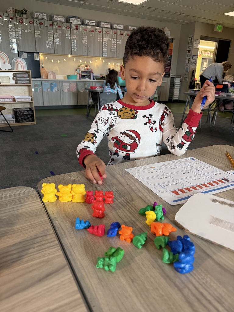 student working on math using counters