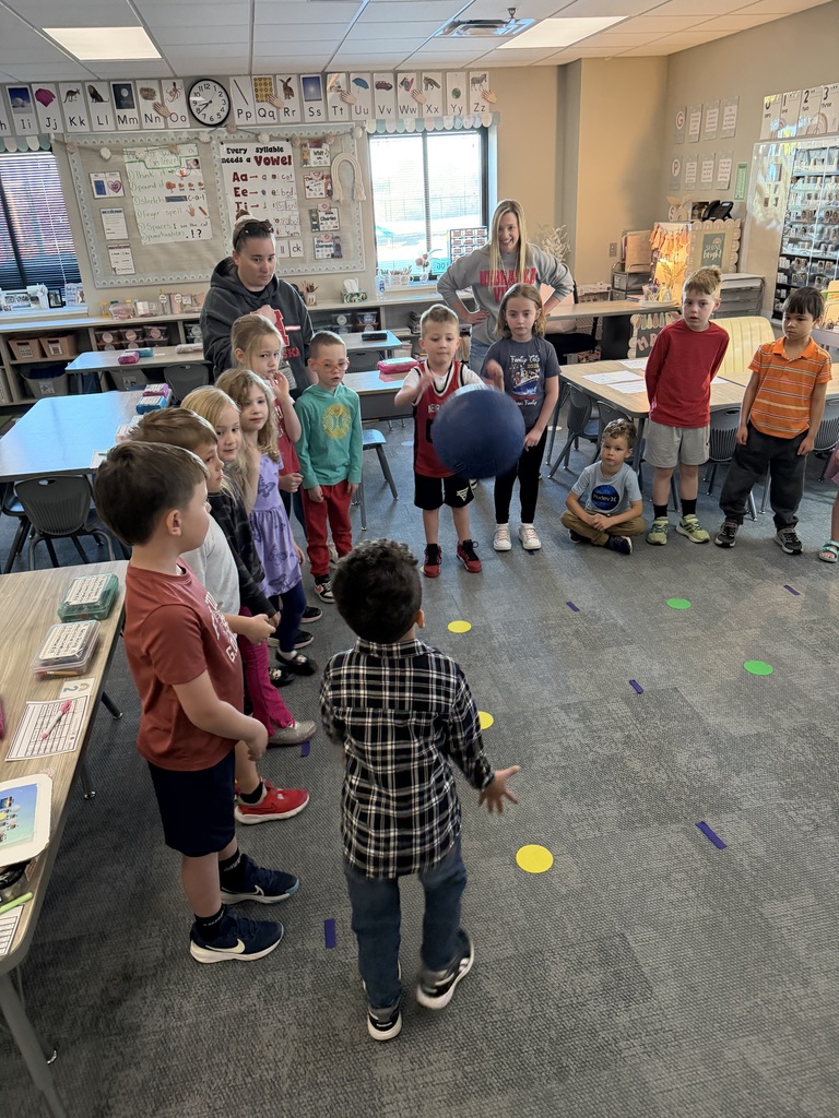 students in a circle playing a game