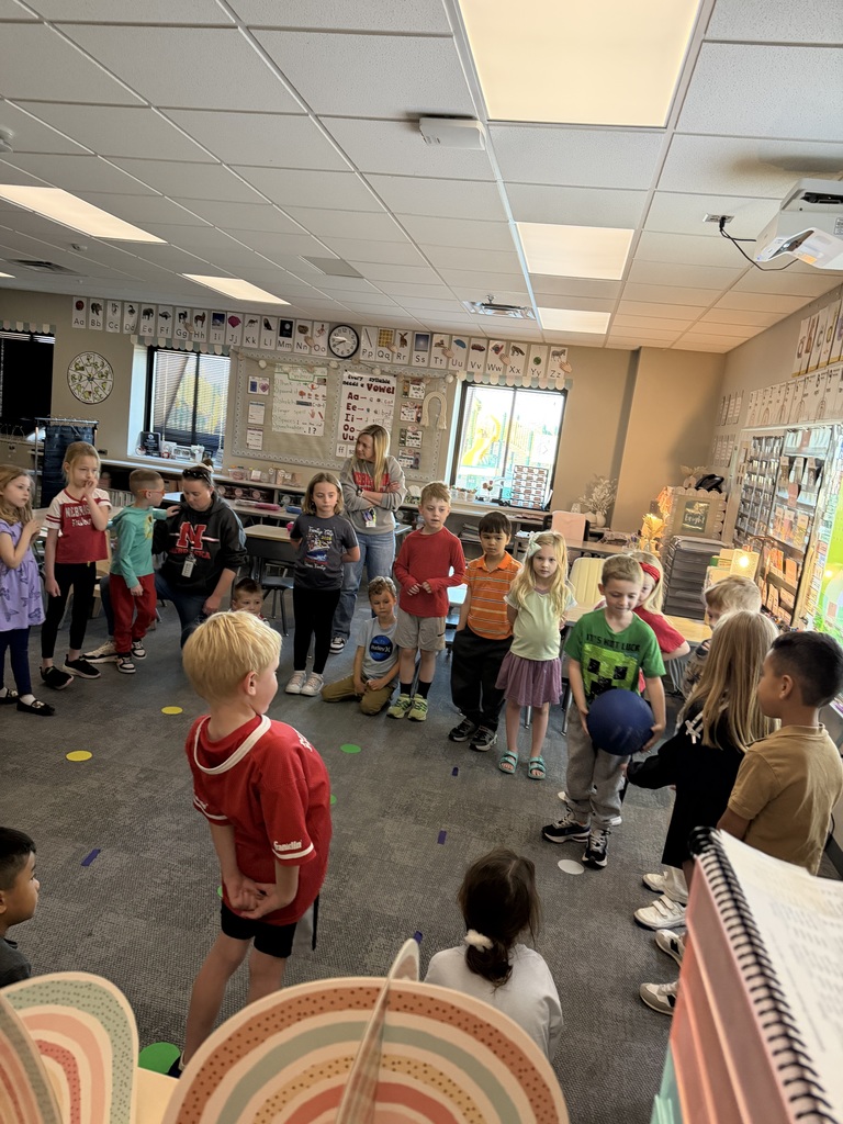 students in a circle playing a game