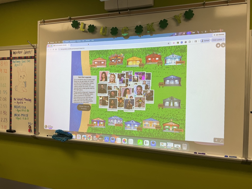 Photo of a sorting activity with a campground, cabin, and celebrity photos being projected on a whiteboard.