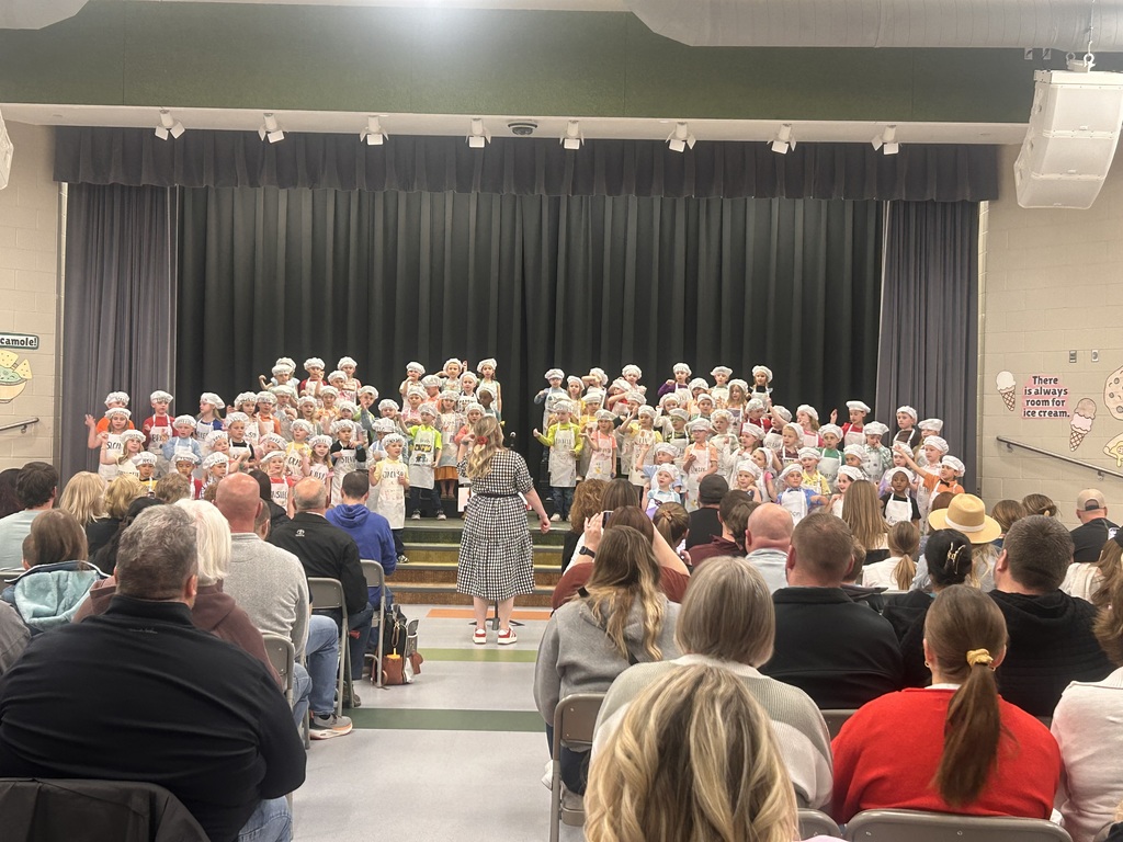 musical concert with students in chefs attire