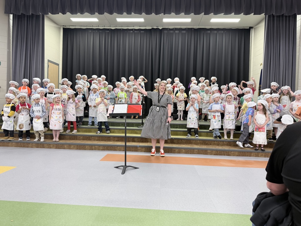 musical concert with students in chefs attire