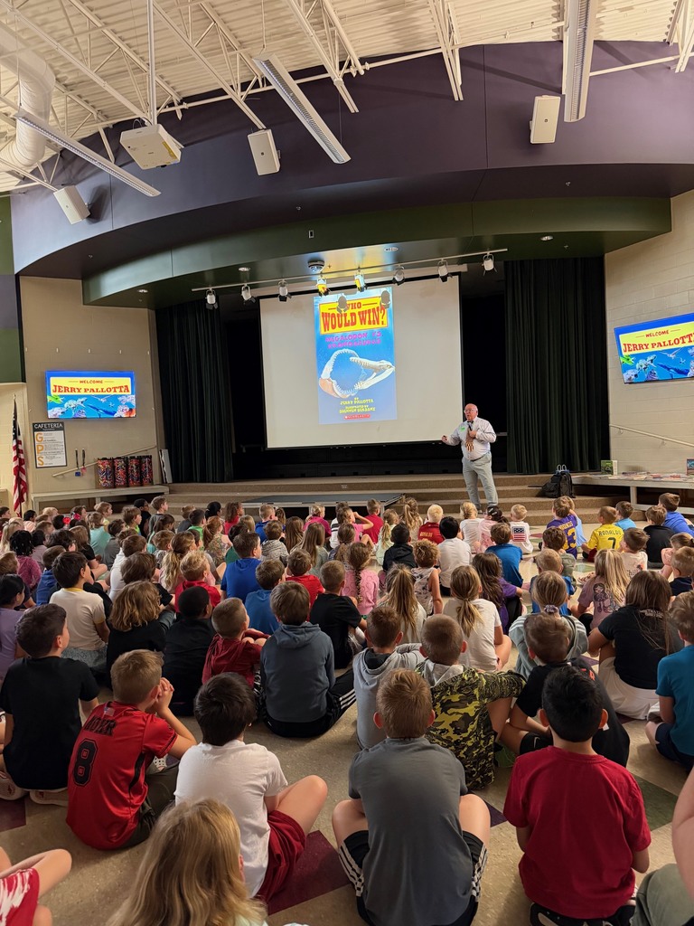 A photo of author Jerry Pallotta talking to a group of students.