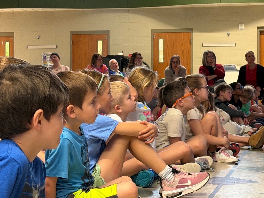 A photo of students watching author Jerry Pallotta present to a group.