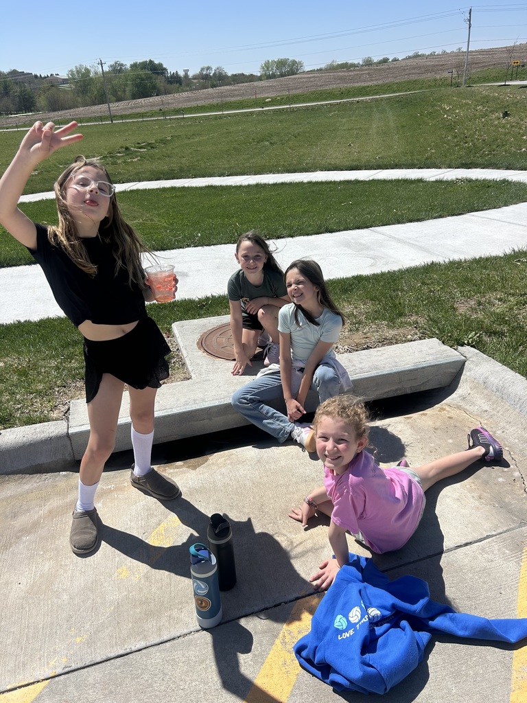 students hanging out outside on a nice day