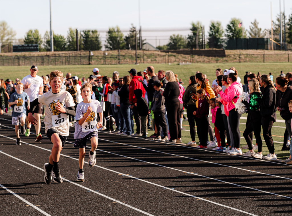 boys running on a track