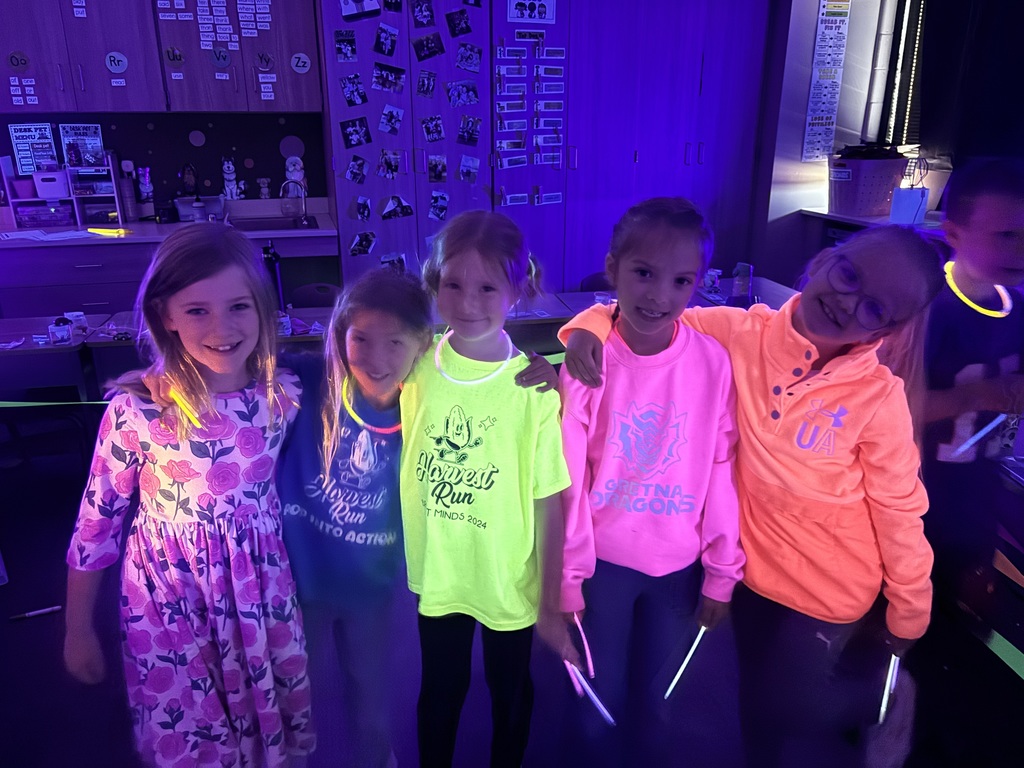 students at a glow party
