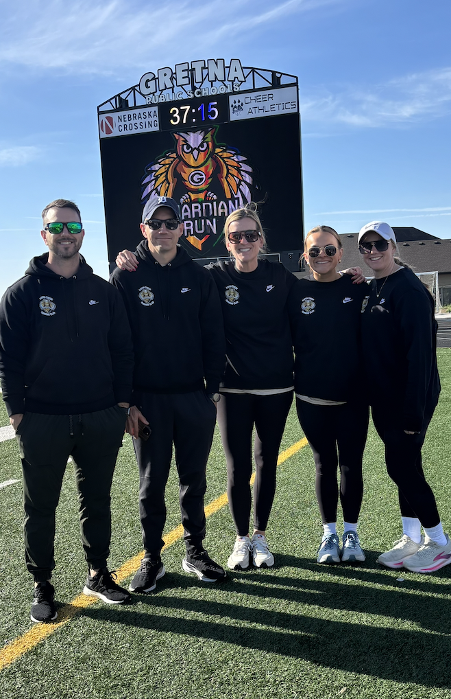 Picture of Aspen Creek running club coaches and ACE principal.