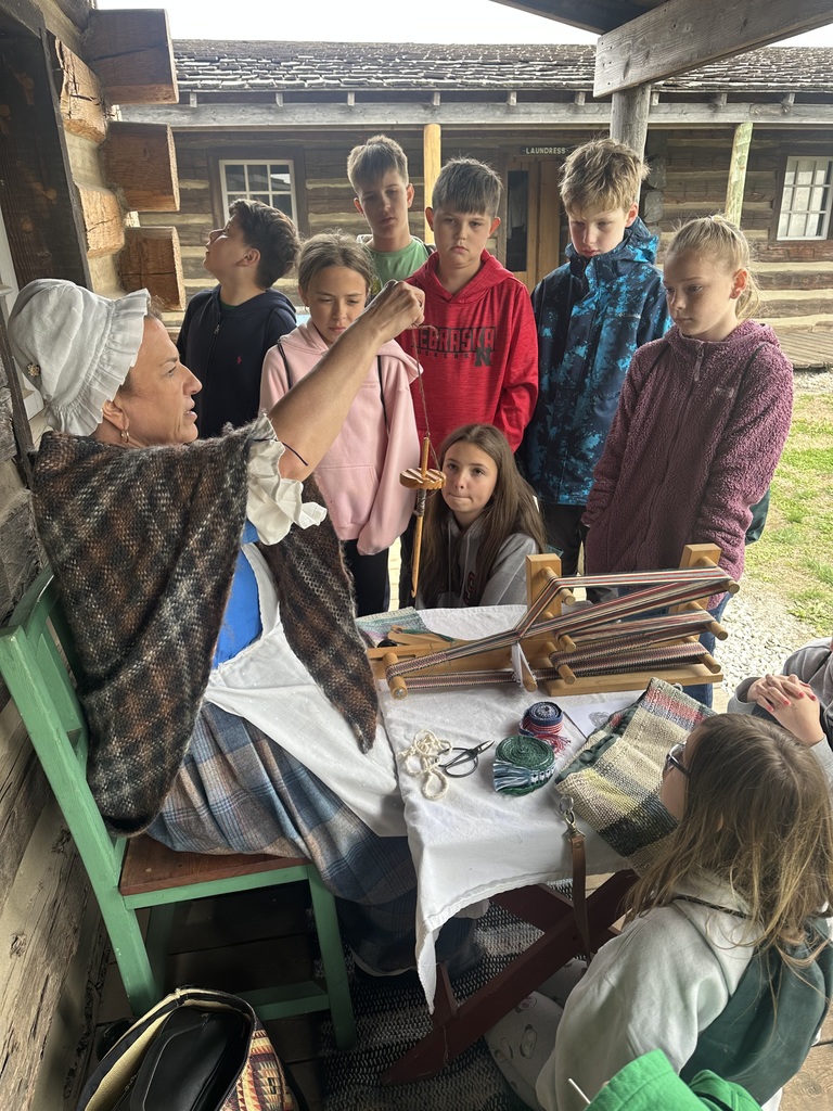 students watching an actor