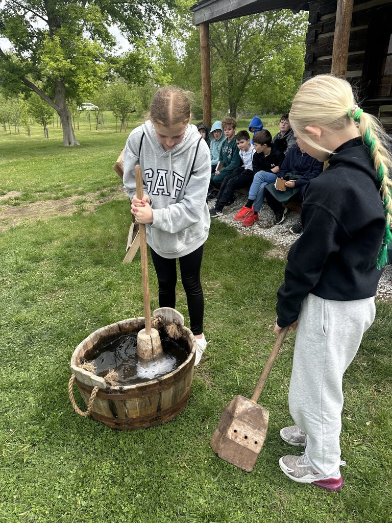 students learning how to wash clothes 100 years ago