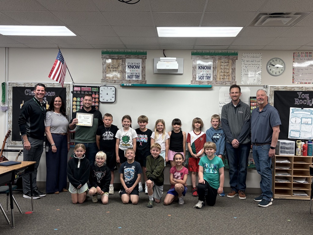Mr. Kohout's 2nd grade class, Mr. Basye, Holly Radke, and MCL construction pictured in the classroom. 