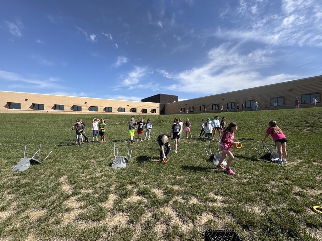 students playing a game with chairs