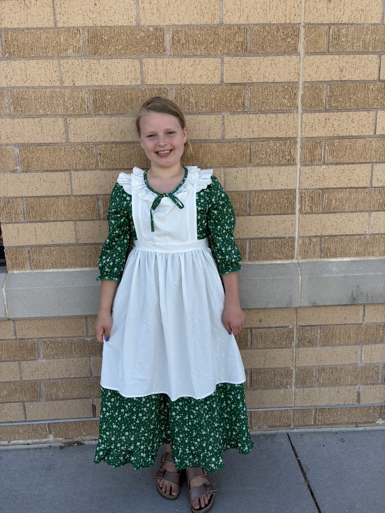 student dressed in a prairie outfit