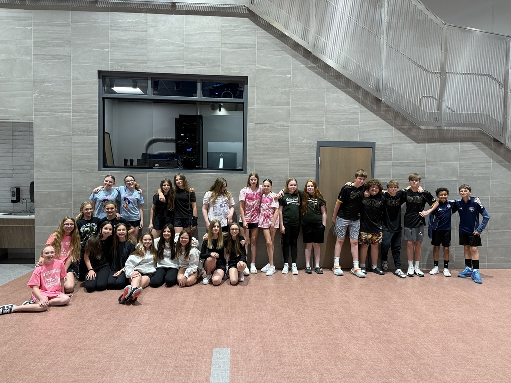 Students dressed in matching outfits. 