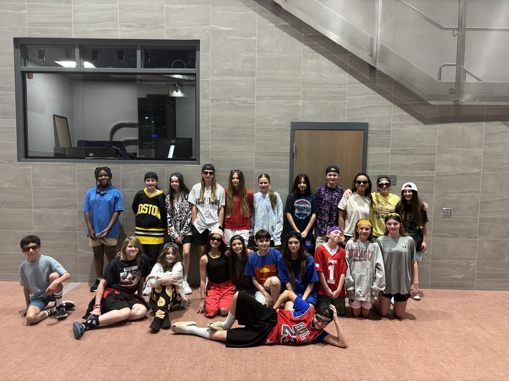 A large group of students pose for the camera. 