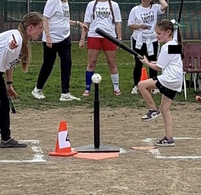 A Guardian athlete hitting the baseball