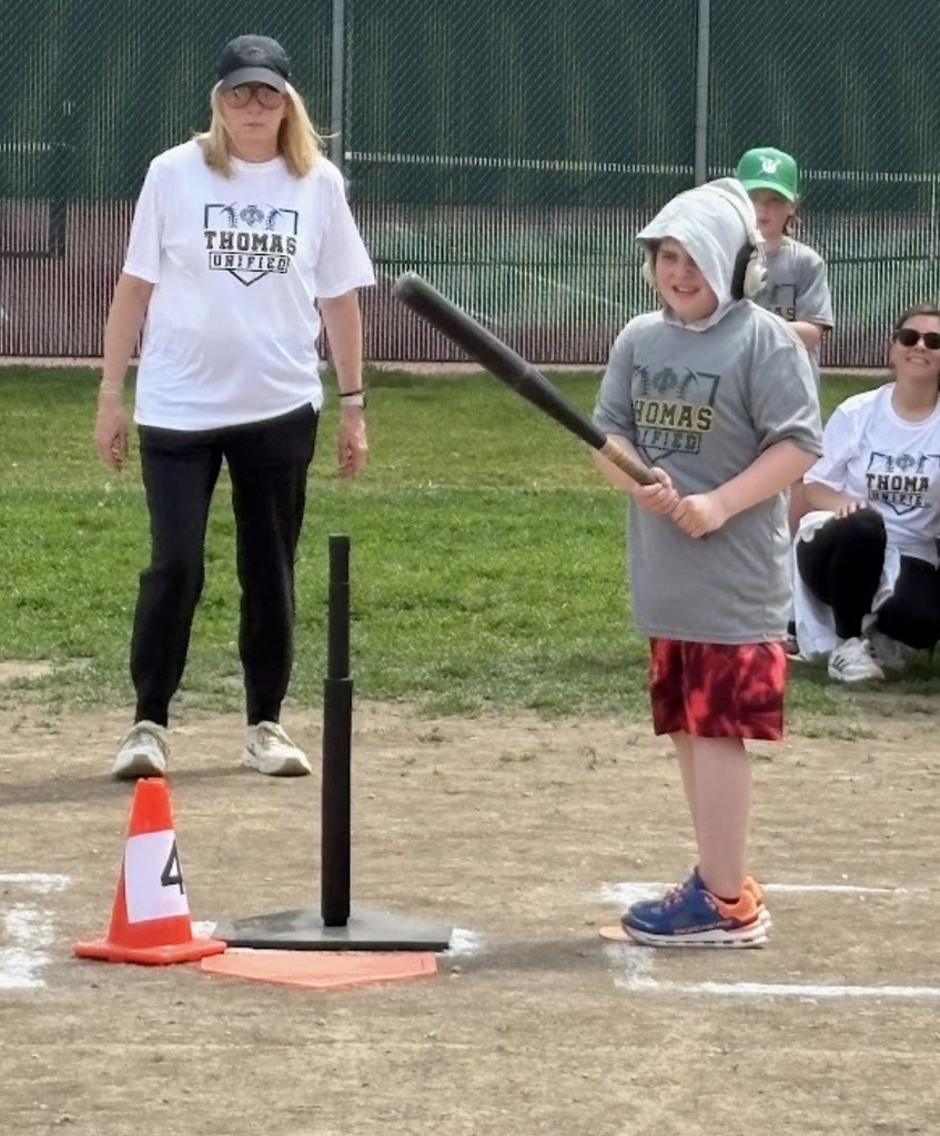 A Guardian athlete hitting the baseball