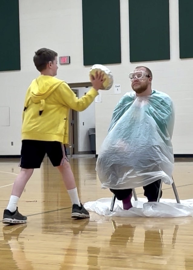 Mr. Harriger getting pied in the face