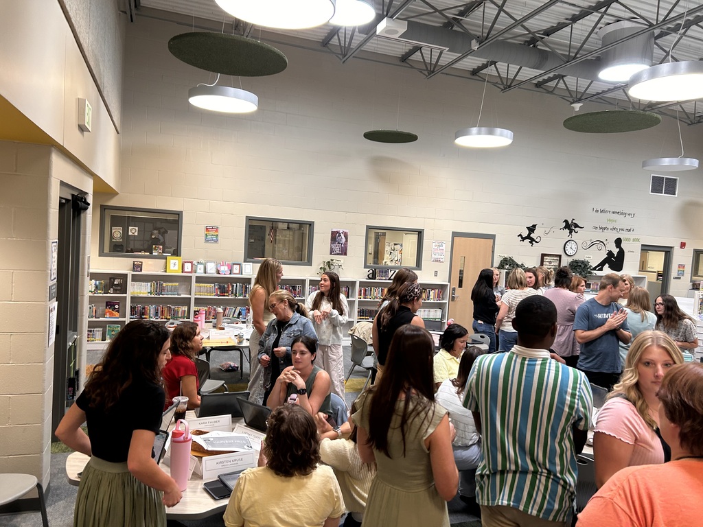 teachers talking in a meeting