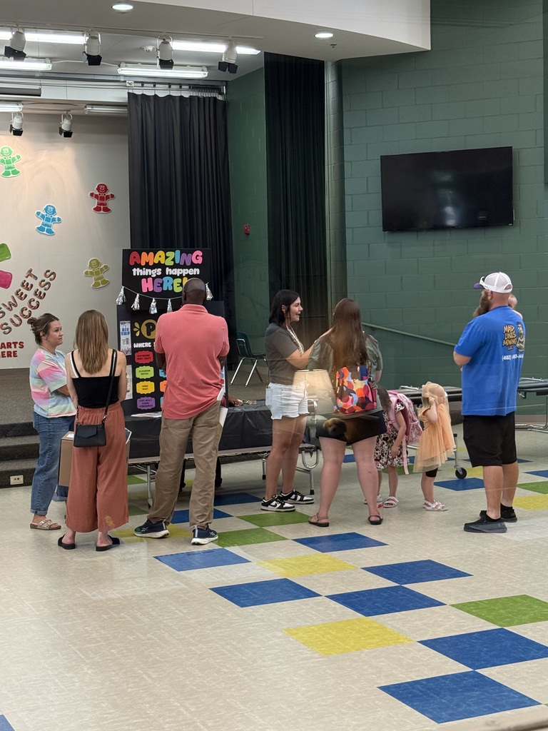 Our amazing PTO answers questions for parents at open house.