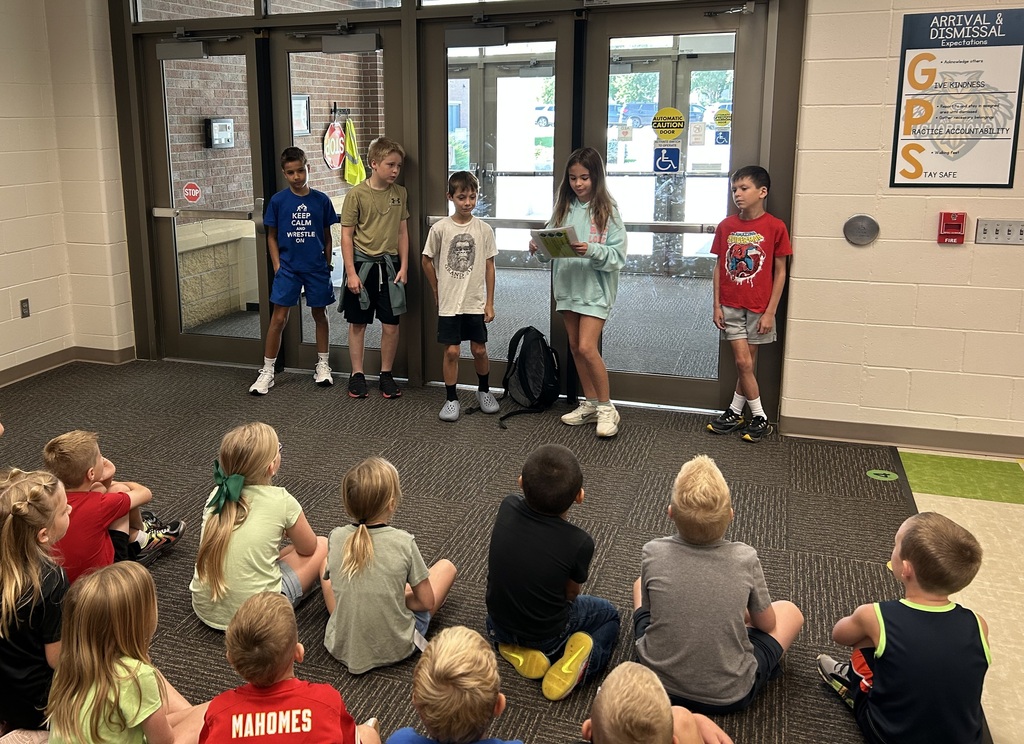 5th Grade students demonstrating positive expectations to kindergarten students.  
