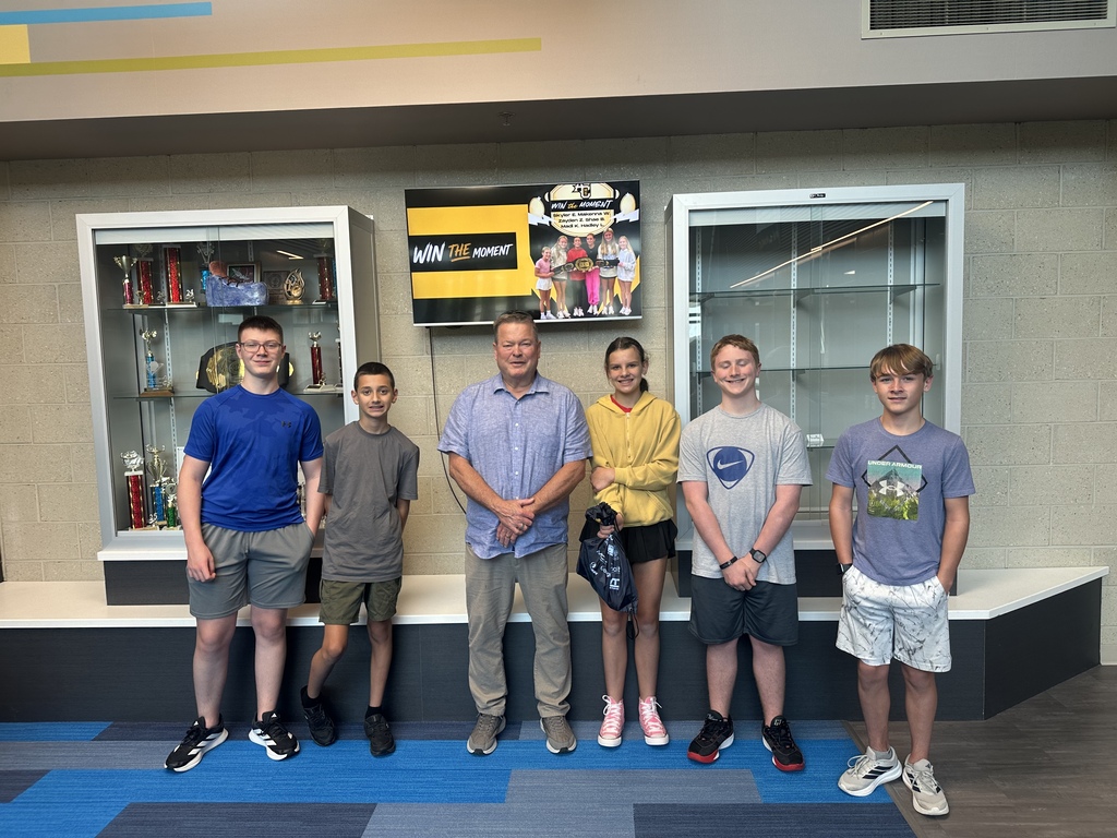 Picture of Public Works Director Kevin O'Brien and our ACMS students who helped unload the construction kits from Grow Sarpy. 