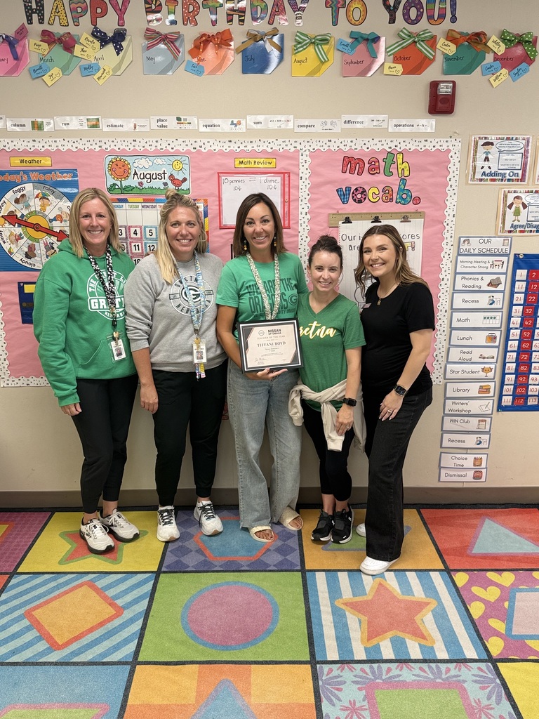 Mrs. Boyd and our 1st grade team with Jamie from Nissan of Omaha.