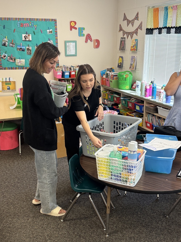 Mrs. Boyd and Jamie delivering her prizes.