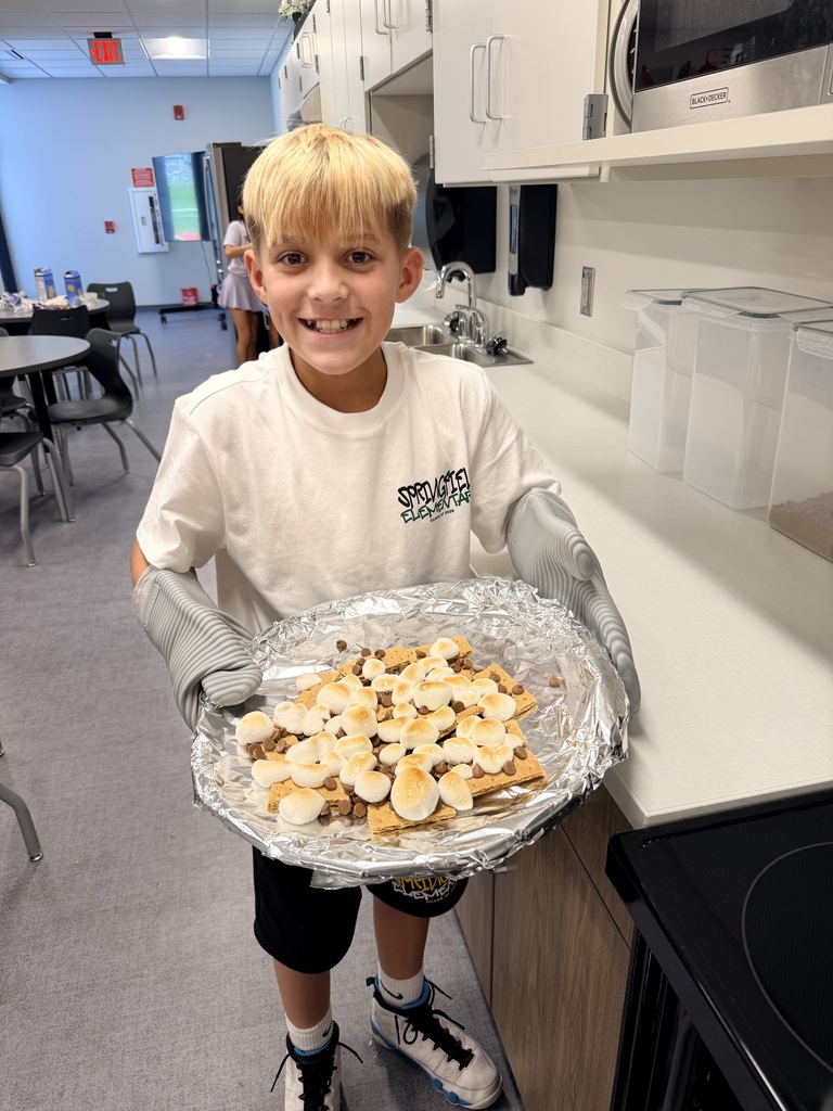 A student holding smores.