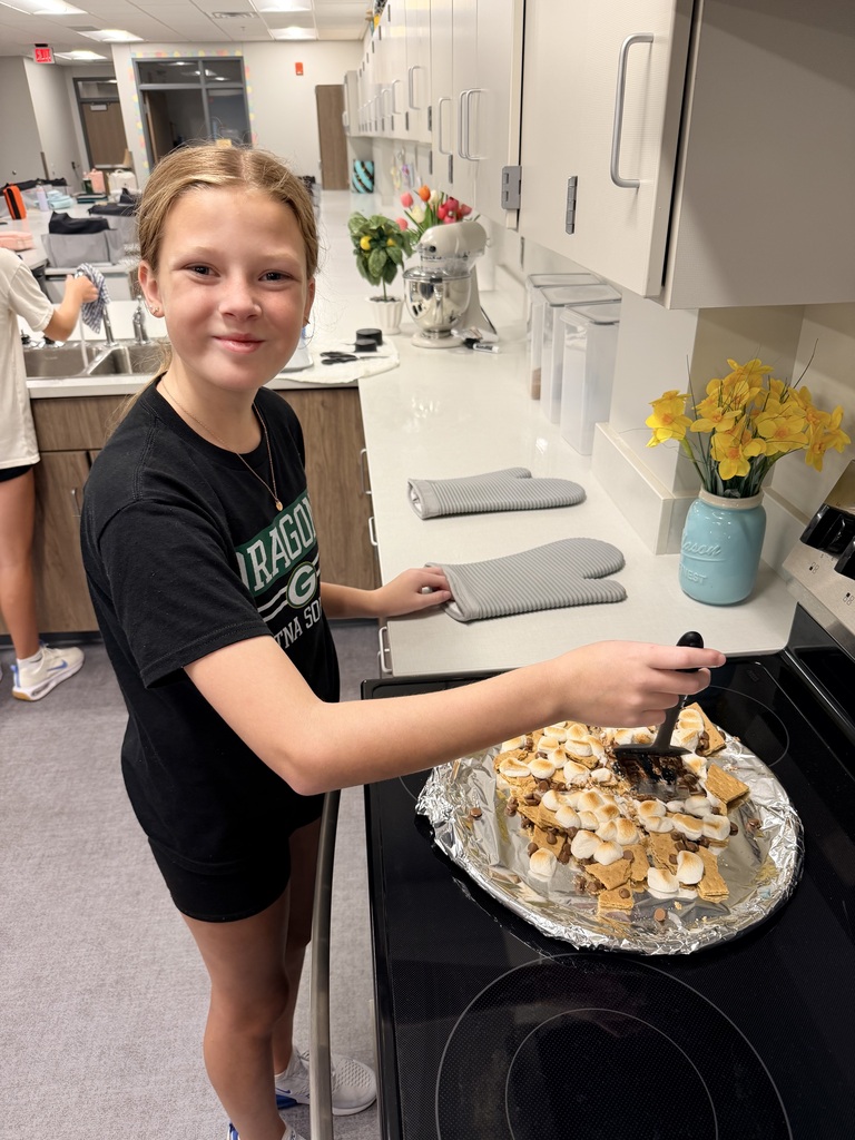 A student making smores nachos.